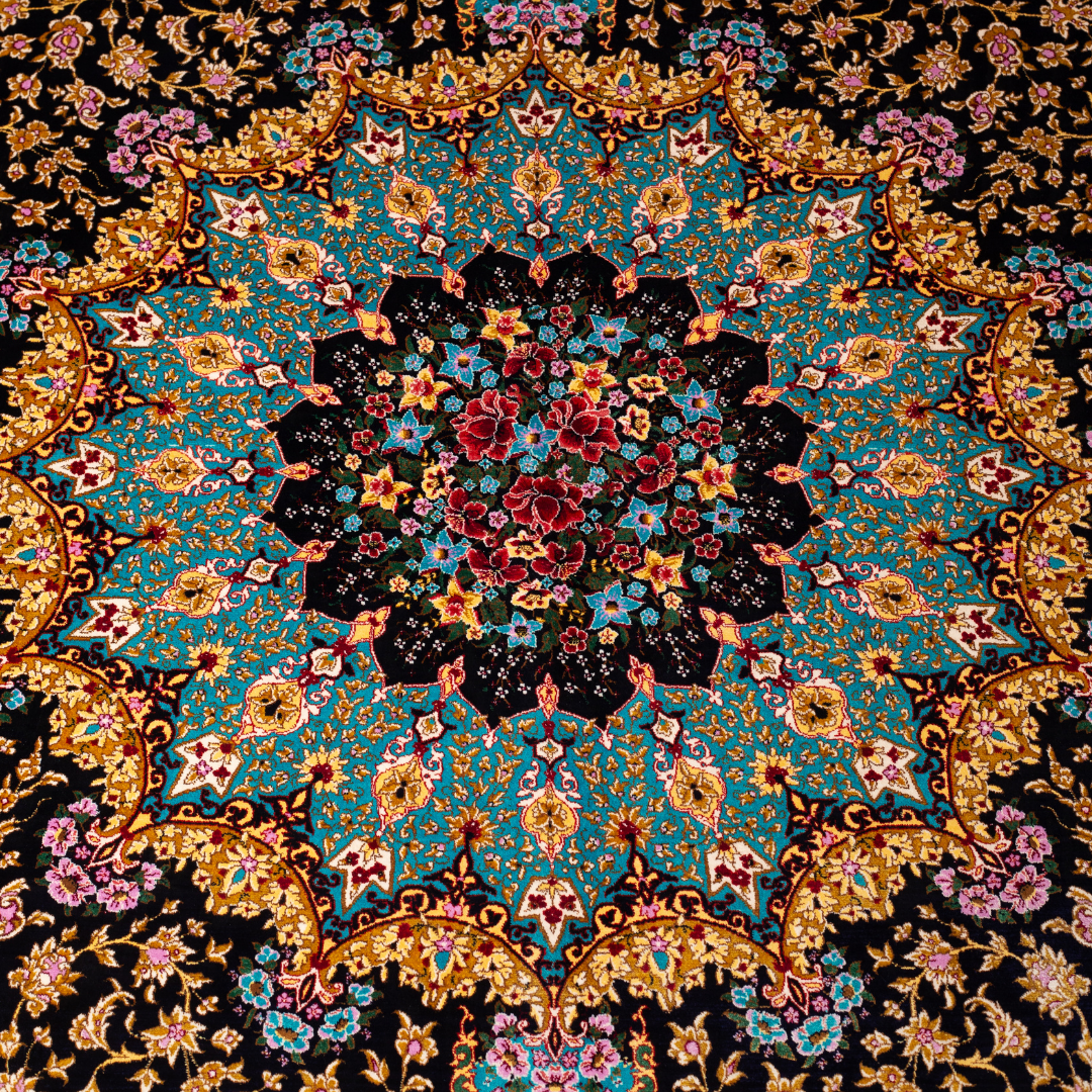 Ilse Silk Rug in 200x300 cm featuring a navy base, turquoise medallion, and intricate floral motifs.