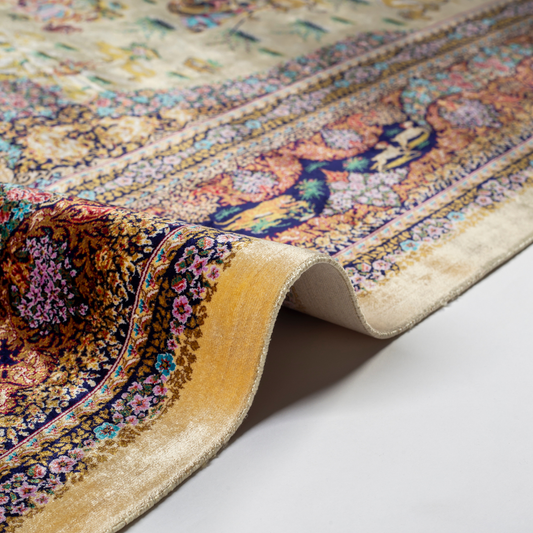 Luxurious silk rug with warrier scene and ornate floral border in rich tones. Intricate details handwoven for timeless appeal.