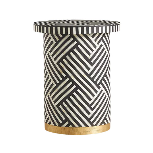 Black bone inlay side table with bold striped pattern, handcrafted with a brass base accent, ideal for modern interiors.