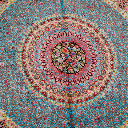 Elegant ivory silk rug featuring pastel floral medallion, delicate vines, and a golden glow. Handwoven to perfection with luxurious texture.

