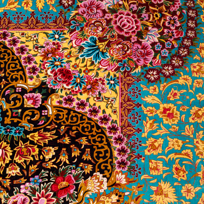 The Amore silk rug features an ornate floral medallion over a navy base, with vivid accents of turquoise, gold, and crimson in 350x250 cm.