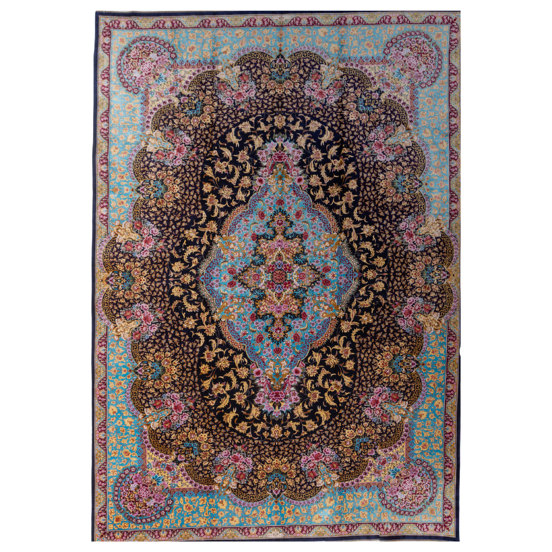 The Amore silk rug features an ornate floral medallion over a navy base, with vivid accents of turquoise, gold, and crimson in 350x250 cm.