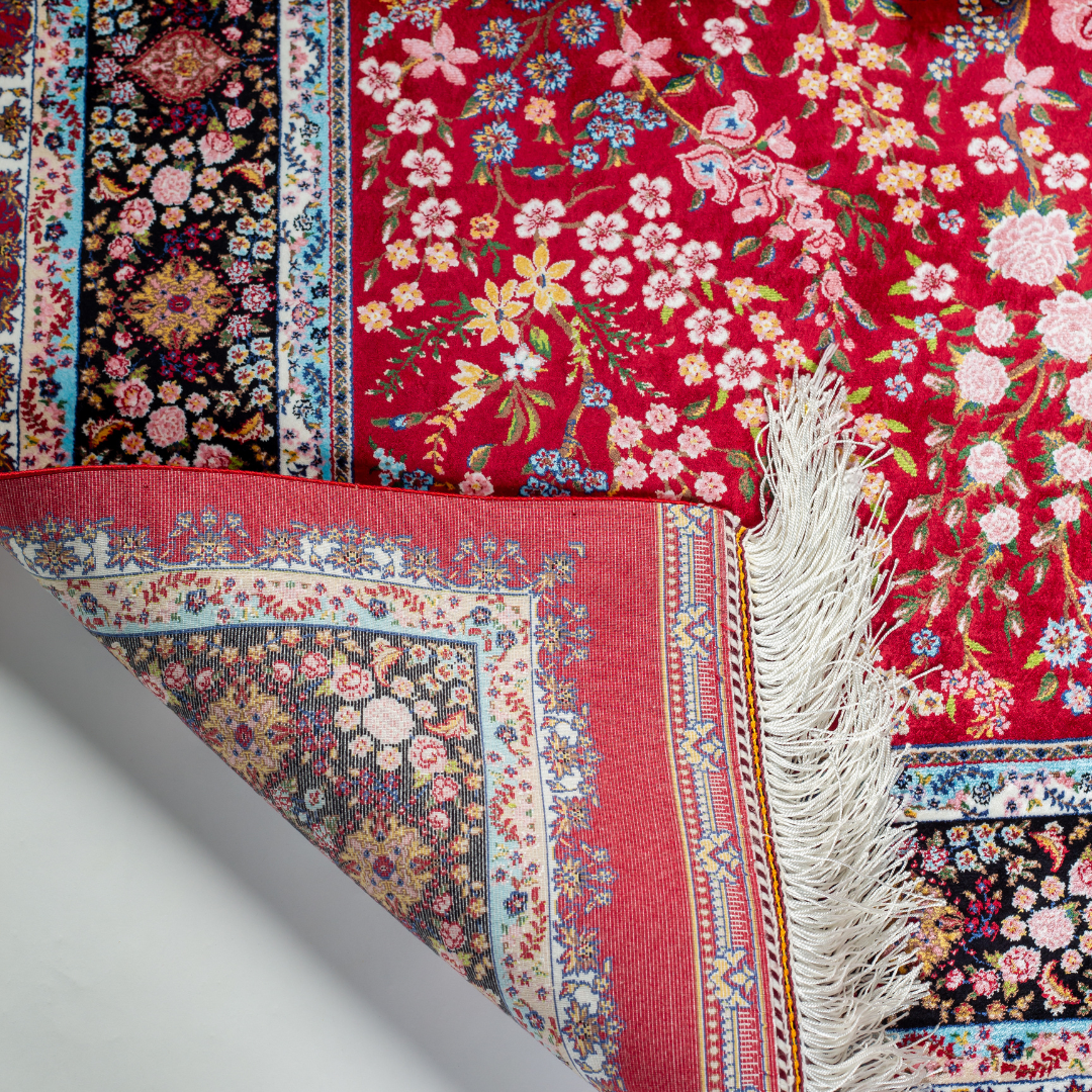 Arden silk rug in 150x100 cm with beige base, bird and floral motifs, and intricate multicolor detailing.