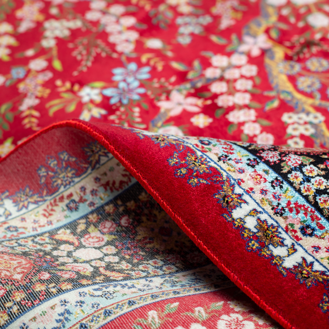 Arden silk rug in 150x100 cm with beige base, bird and floral motifs, and intricate multicolor detailing.