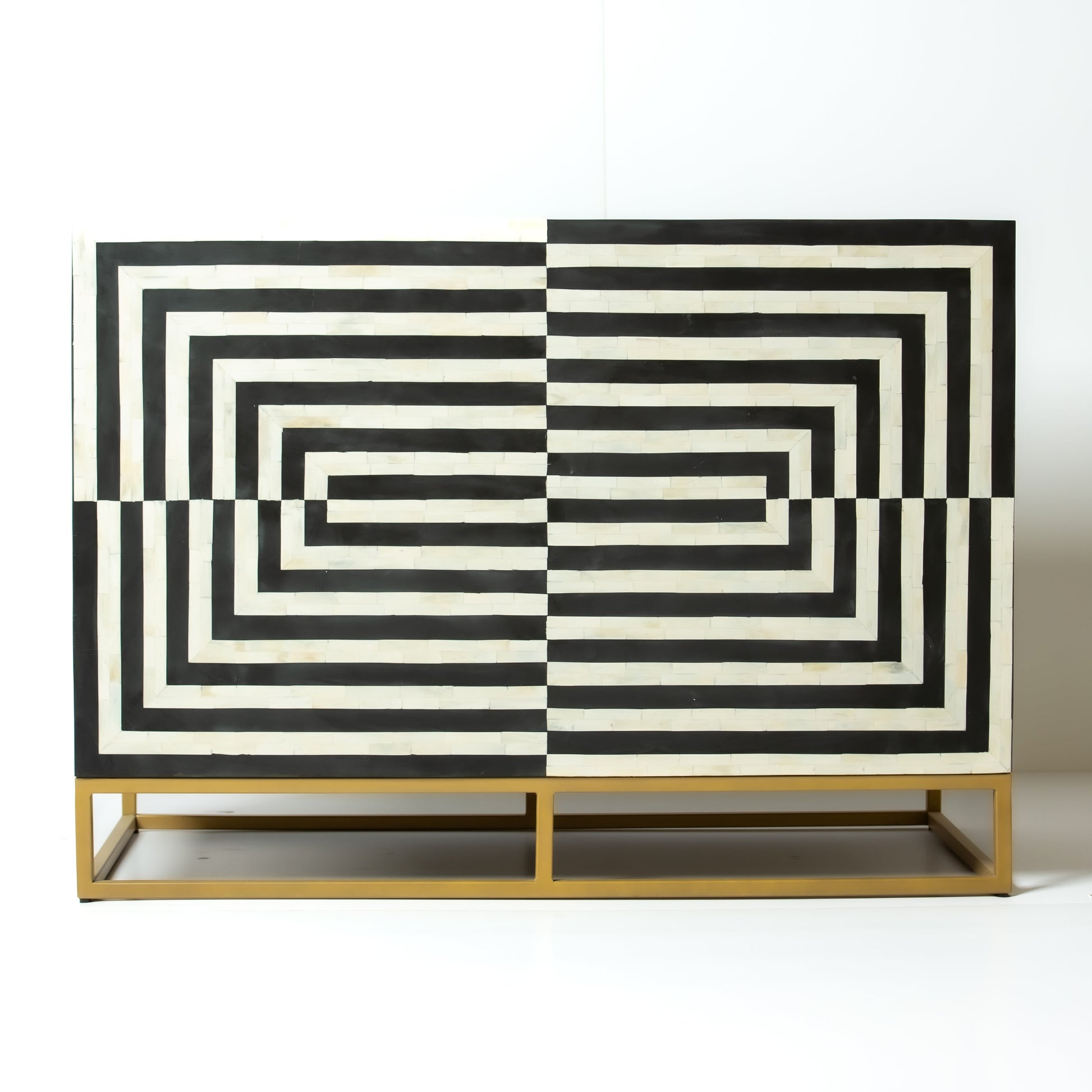 Black bone inlay bar cabinet with bold geometric front and open back storage, handmade with brass base and striking design.
