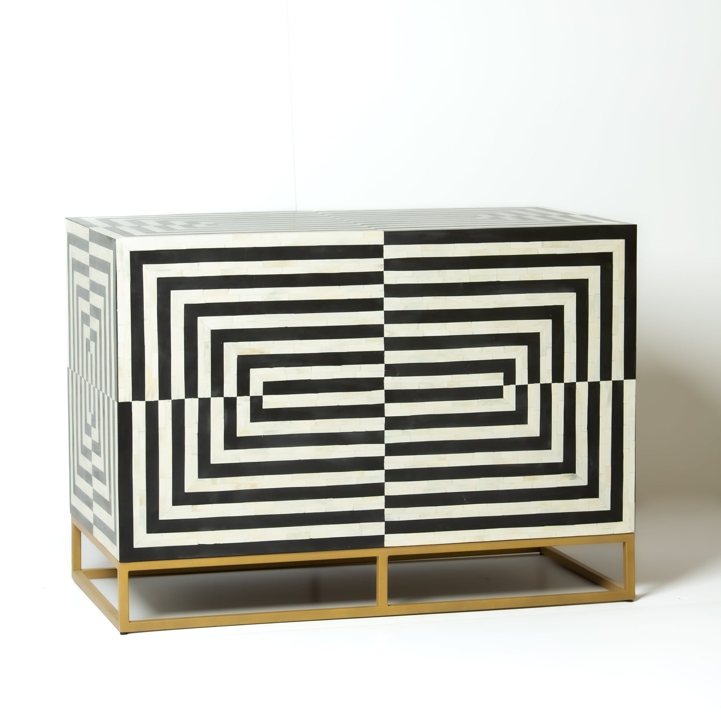 Black bone inlay bar cabinet with bold geometric front and open back storage, handmade with brass base and striking design.
