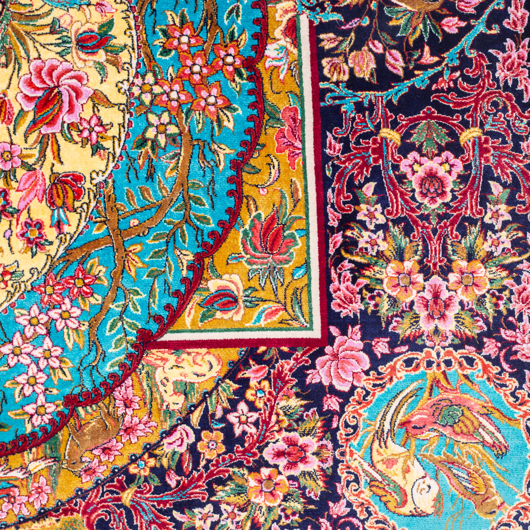 Belaw Silk Rug featuring navy base with gold vines, teal medallions, and pink floral detailing, 150x100 cm.