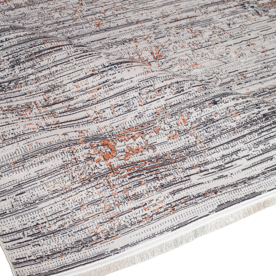 Core Cotton rug in 400x300 cm featuring muted tones of grey, ivory, blue, and burnt orange in a softly distressed modern texture.
