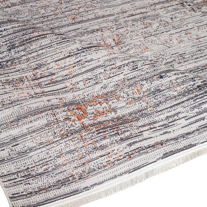 Core Cotton rug in 400x300 cm featuring muted tones of grey, ivory, blue, and burnt orange in a softly distressed modern texture.