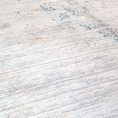 Core Cotton rug in 400x300 cm featuring muted tones of grey, ivory, blue, and burnt orange in a softly distressed modern texture.