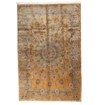 Golden silk rug featuring a central medallion, floral border, and teal highlights, shown in detailed close-ups and full view.