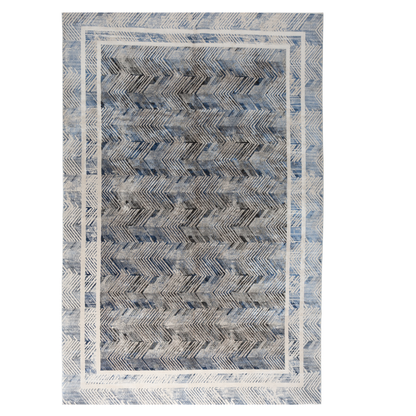 Eclipse cotton rug featuring a bold chevron pattern in grey, blue, and ivory with a distressed texture, perfect for contemporary interiors.