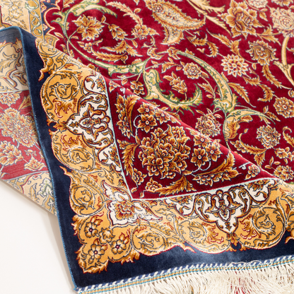 Flair Silk Rug in 200x300 cm with crimson red base, ornate golden floral patterns, navy accents, and intricate woven detailing.