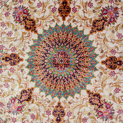 Galeo silk rug featuring central medallion, navy border, and multi-colour floral motifs on an ivory base. Size 150x100 cms.