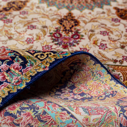 Galeo silk rug featuring central medallion, navy border, and multi-colour floral motifs on an ivory base. Size 150x100 cms.