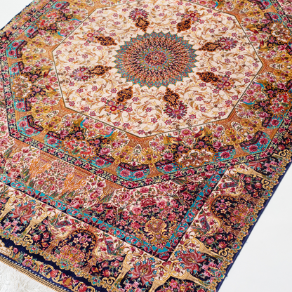 Galeo silk rug featuring central medallion, navy border, and multi-colour floral motifs on an ivory base. Size 150x100 cms.