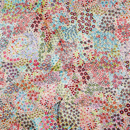 Gohan Silk Rug with intricate floral detailing in red, blue, and pastel tones on an ivory base with turquoise borders, 150x100 cm.