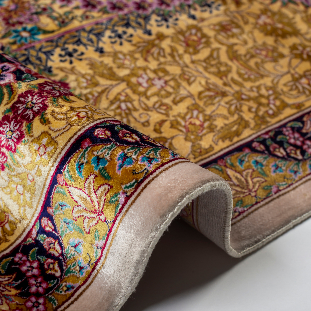 Handwoven Bora floral silk rug top
