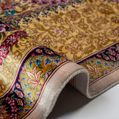 Handwoven Bora floral silk rug top
