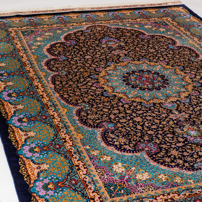 Ilse Silk Rug in 200x300 cm featuring a navy base, turquoise medallion, and intricate floral motifs.