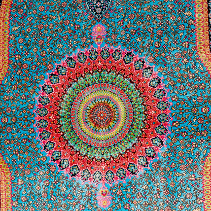 Jaze Silk Rug featuring a central floral medallion on a turquoise base with red, green, and black detailing, size 150x100 cm.
