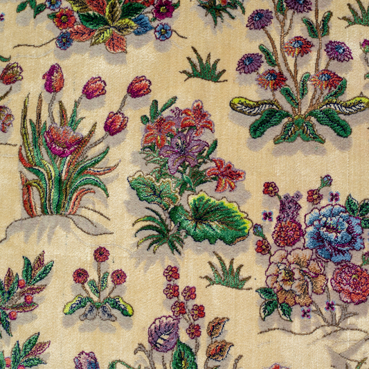 Floral silk rug in beige with multicolor detailing, handmade with intricate weaving and vibrant botanical patterns.

