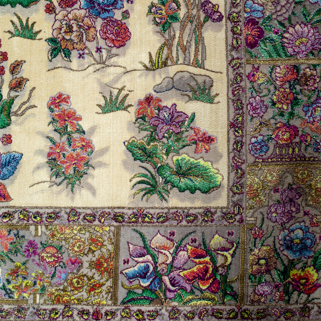 Floral silk rug in beige with multicolor detailing, handmade with intricate weaving and vibrant botanical patterns.

