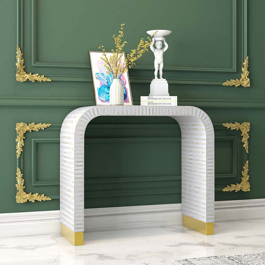 Elegant white bone inlay console with intricate detailing and a modern curved silhouette.