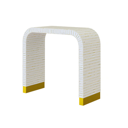 Elegant white bone inlay console with intricate detailing and a modern curved silhouette.