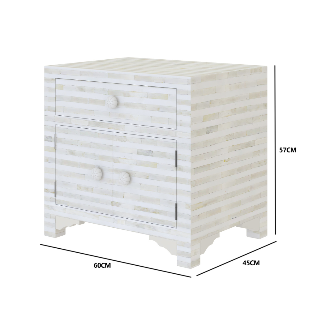 The Lume Side Drawer features white bone inlay with cabinet doors and a drawer. A graceful accent for luxury interiors.
