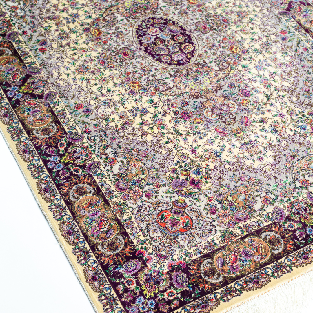 Miren silk rug in ivory and purple with intricate floral design, handwoven with fine craftsmanship and premium detailing.
