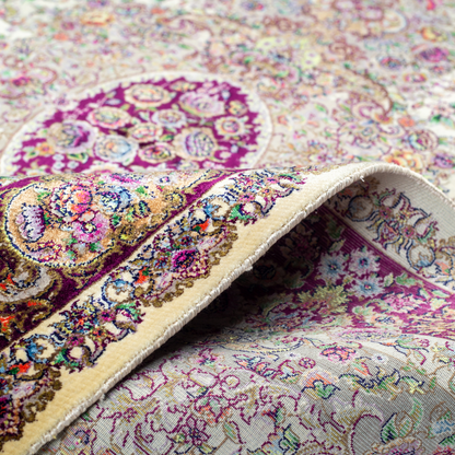 Miren silk rug in ivory and purple with intricate floral design, handwoven with fine craftsmanship and premium detailing.
