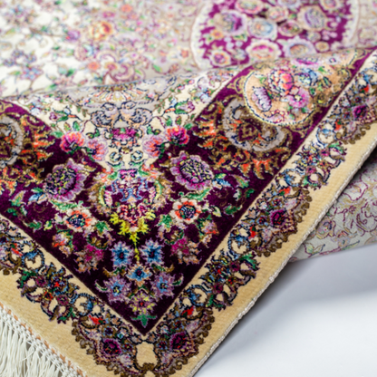 Miren silk rug in ivory and purple with intricate floral design, handwoven with fine craftsmanship and premium detailing.
