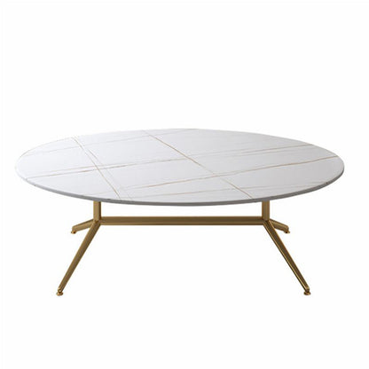 Oval white marble coffee table with subtle gold vein detailing and sleek gold legs. A modern and elegant addition to any living space.