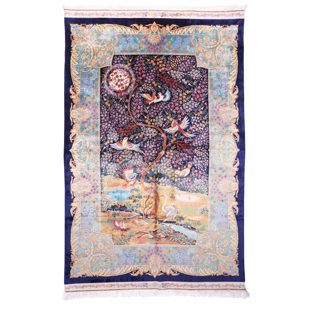 Elegant silk rug with flying birds and floral tree scene, bordered in ornate gold and blue. Handwoven with incredible detail and texture.

