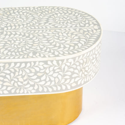 Elegant grey bone inlay coffee table with a gold base. Compact, handcrafted and eye-catching – a timeless addition to your space.