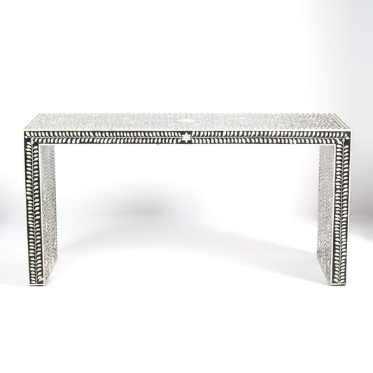 Black bone inlay console table with floral and vine motifs, handcrafted by artisans and finished with intricate detailing across the surface.