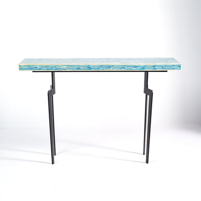 Console table with a blue and white patterned top