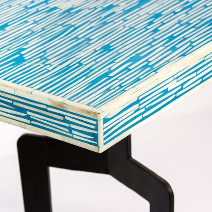 Table with blue and white geometric pattern 