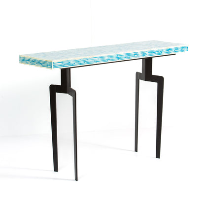 Table with a blue and white patterned top