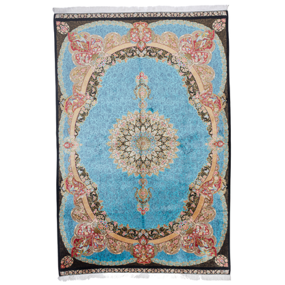 Luxury blue silk rug featuring a detailed central medallion, floral motifs, and ornate bird patterns in gold, coral, and black accents.