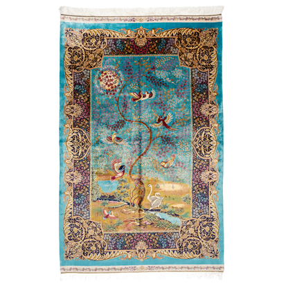 Luxurious silk rug with turquoise base, floral borders, and tree of life with colorful birds and swans.

