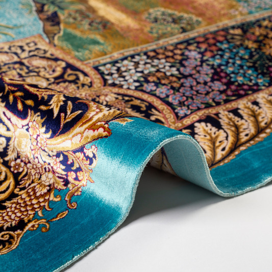 Luxurious silk rug with turquoise base, floral borders, and tree of life with colorful birds and swans.

