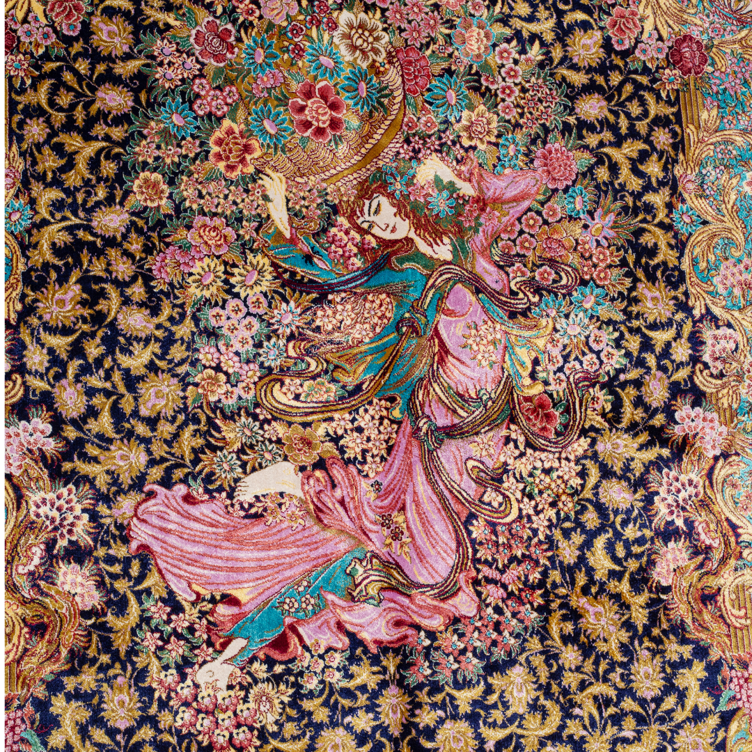 Elegant silk rug in navy, pink, gold, and turquoise with detailed-inspired floral and dancer motifs.


