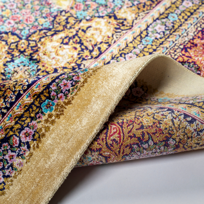 Luxurious silk rug with warrier scene and ornate floral border in rich tones. Intricate details handwoven for timeless appeal.