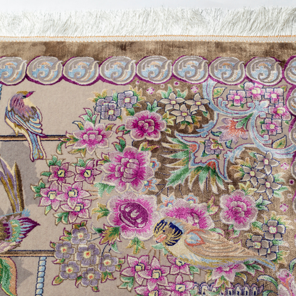 Handwoven silk rug featuring birds on a beige grid, floral corners, and classical columns. A joyful yet elegant statement piece.

