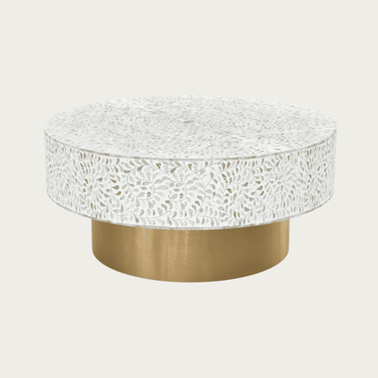 Round white mother of pearl inlay coffee table with floral design and a gold cylindrical base. Available in 3 size variants.