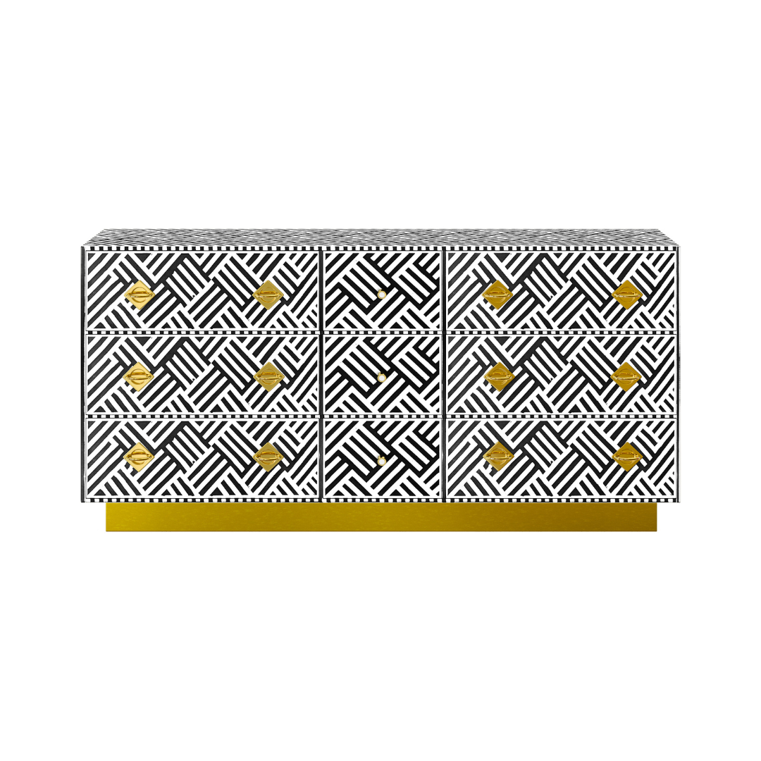 Luxury black and white bone inlay chest of drawers with brass accents and geometric design, handcrafted for statement interiors.