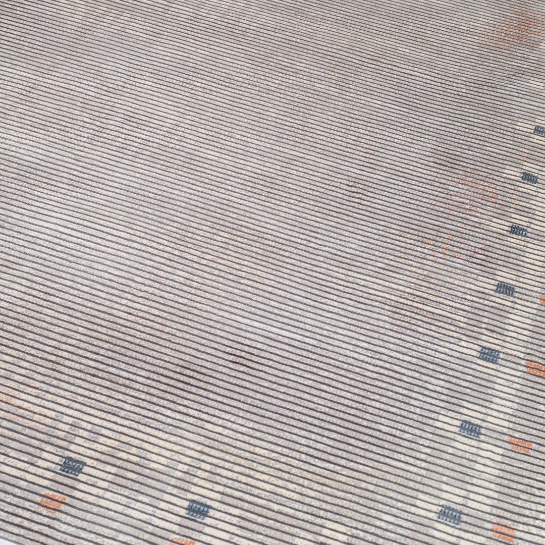 Grey striped Cotton rug with fine orange and blue motif border, in 400x300 cms size, perfect for modern interiors.