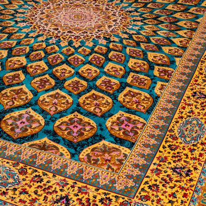 Spot silk rug in 350x250 cms featuring turquoise and mustard floral designs with a detailed medallion and golden border work.